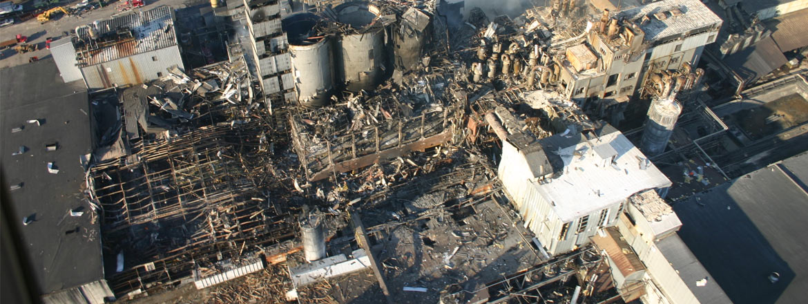 A sugar dust explosion in an enclosed conveyor caused by many years of neglect