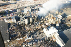 A sugar dust explosion in an enclosed conveyor caused by many years of neglect