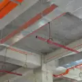 ceiling in a waste sorting plant with a fire protection system